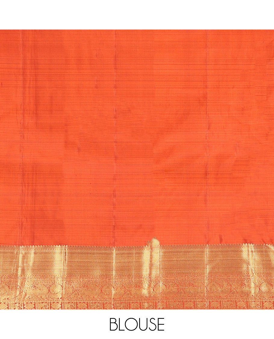 Orange Kanchipuram Wedding Silk Saree, Artfully Detailed with Jacquard Design on Its Body, Highlighted by Zari Border of Thilakam, Kuyil Kann, Diamond, Mayil, Yaali, and Yaanai Designs, Grand Jaal Pallu, and Paired with a Matching Blouse