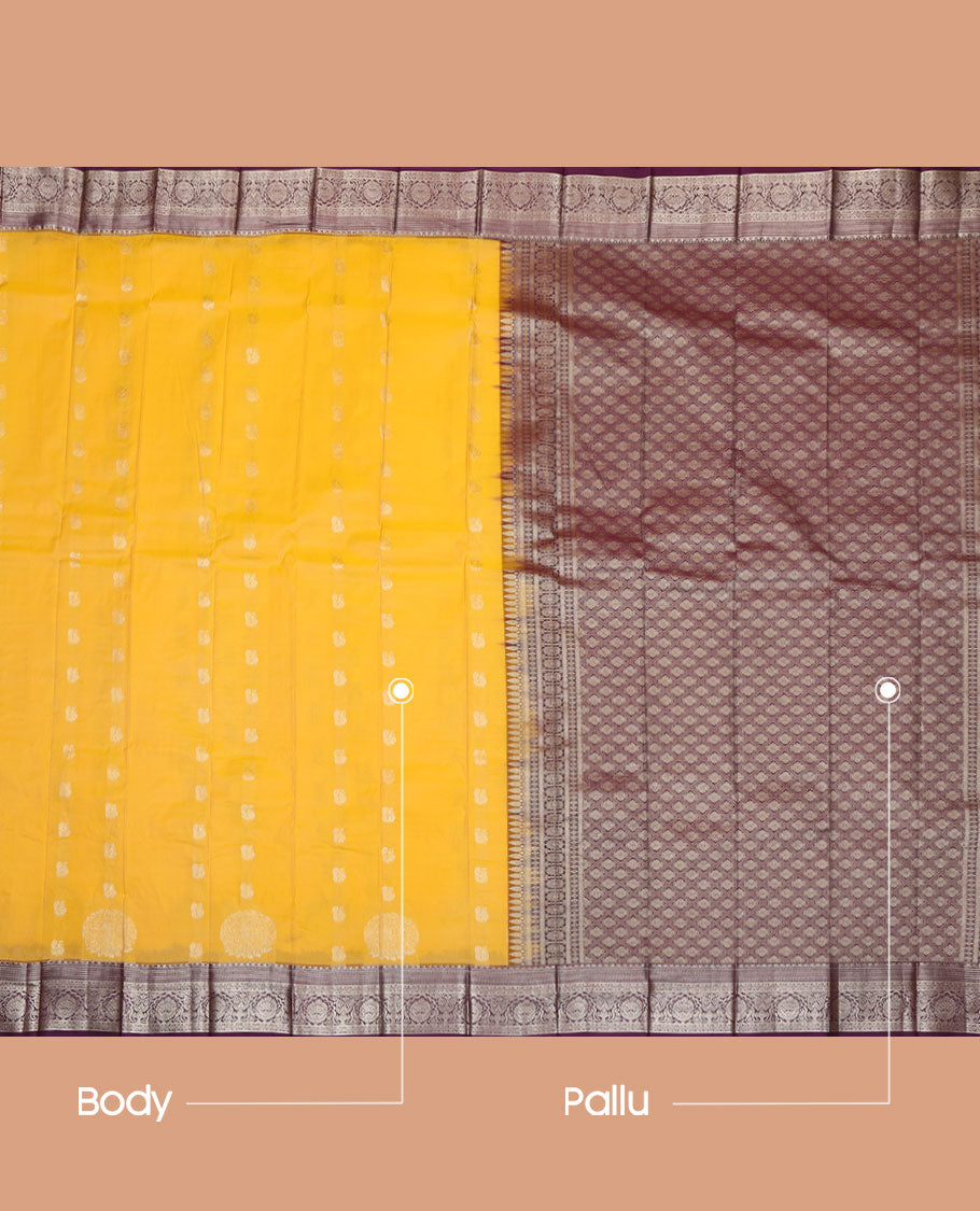 Yellow Budget Silk Saree, Elevated with Zari Buttas All Over Its Body, Complemented by a Contrast Traditional Zari Design Border, Pallu Depicts Jaal Designs, and Paired with a Contrast Blouse