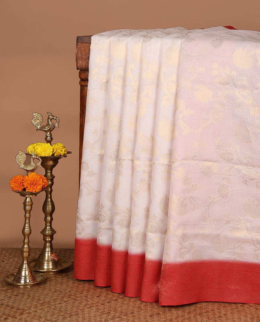 Cream with red zari jall weaving design banaras brasso saree with contrast jacquard border & weaving pallu along with butta design blouse