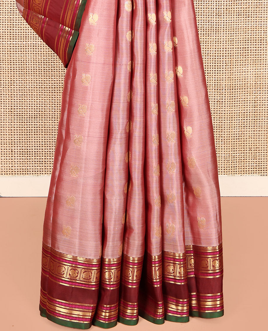 Pink Vasundhara Lite Silk Mix Saree, Decked Up with Mayil-Chakram Buttas, a Contrast Traditional Rettai Pettu Border, Pallu of Mayil-Yaanai Butta Enclosed Checks, and a Contrast Blouse