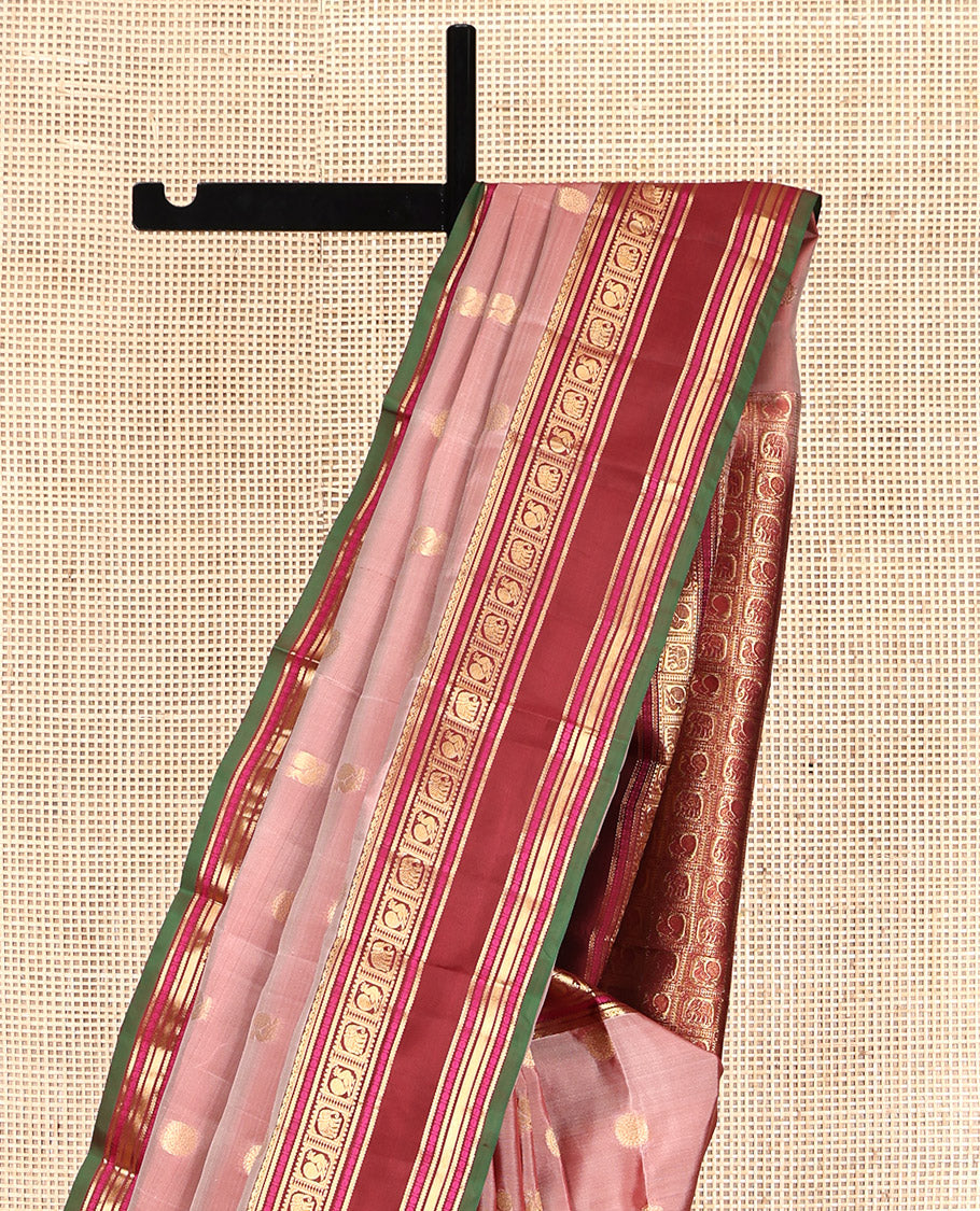 Pink Vasundhara Lite Silk Mix Saree, Decked Up with Mayil-Chakram Buttas, a Contrast Traditional Rettai Pettu Border, Pallu of Mayil-Yaanai Butta Enclosed Checks, and a Contrast Blouse