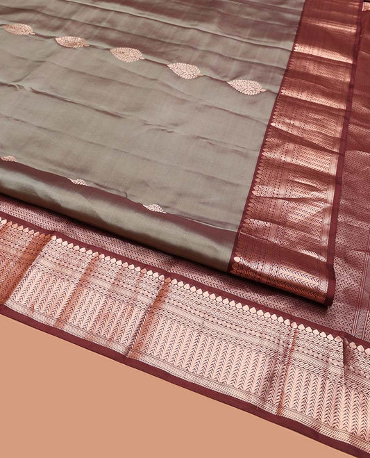 Grey Vasundhara Silk Saree, Finely Crafted with Zari Buttas on Its Body, Complemented by Contrast Border of Thilakam Mokku, Diamond, Rettai Neli, and Kathir Designs, Intricately Designed Pallu, and Paired with a Contrast Blouse