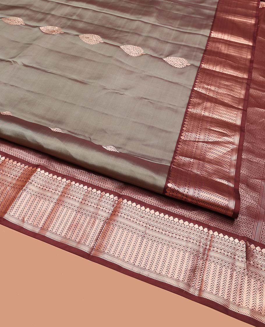 Grey Vasundhara Silk Saree, Finely Crafted with Zari Buttas on Its Body, Complemented by Contrast Border of Thilakam Mokku, Diamond, Rettai Neli, and Kathir Designs, Intricately Designed Pallu, and Paired with a Contrast Blouse