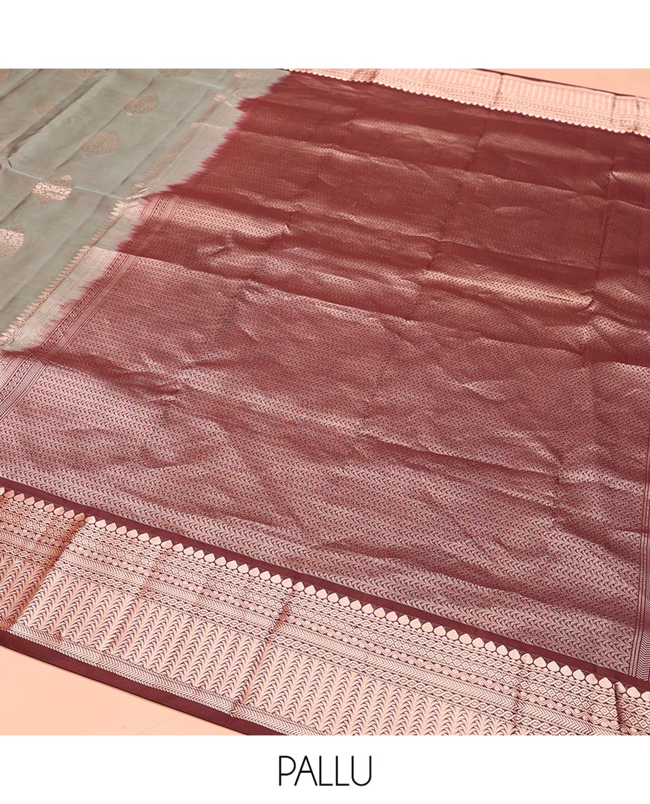 Grey Vasundhara Silk Saree, Finely Crafted with Zari Buttas on Its Body, Complemented by Contrast Border of Thilakam Mokku, Diamond, Rettai Neli, and Kathir Designs, Intricately Designed Pallu, and Paired with a Contrast Blouse