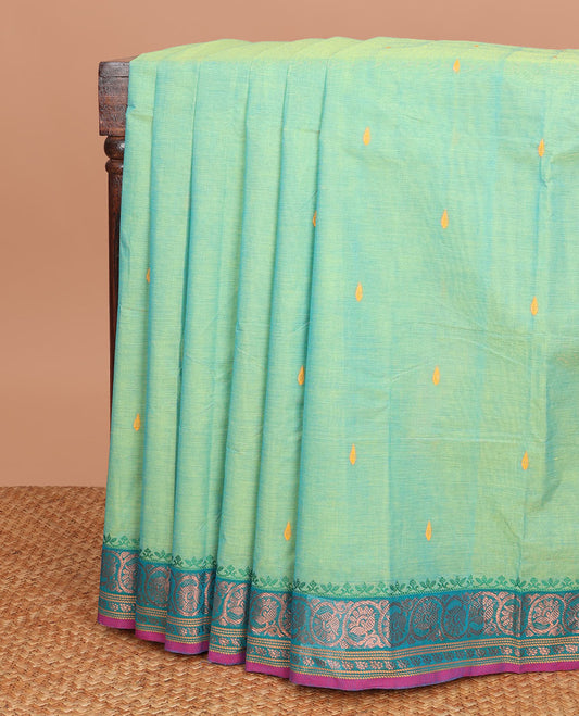 Blue Chettinad cotton saree with all-over buttas, contrast zari border of floral creeper designs & pallu of stripes