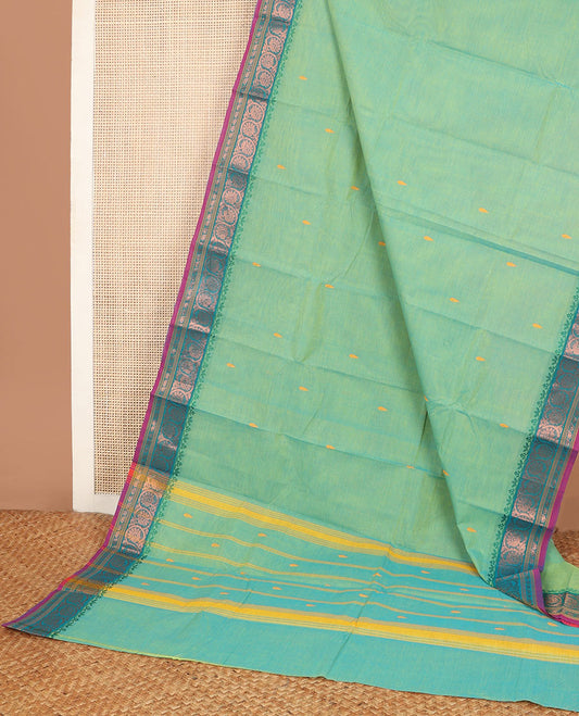 Blue Chettinad cotton saree with all-over buttas, contrast zari border of floral creeper designs & pallu of stripes