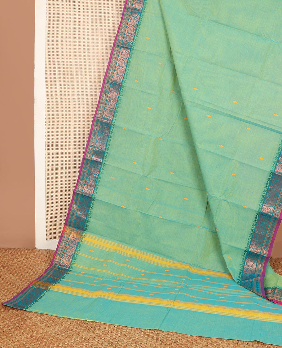 Blue Chettinad cotton saree with all-over buttas, contrast zari border of floral creeper designs & pallu of stripes