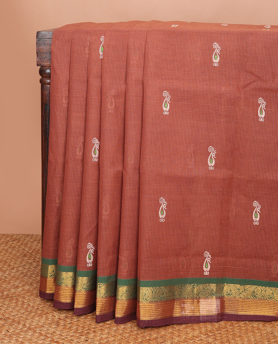 Brown micro-checked & peacock buttas Andhra cotton saree, contrast traditional border & chakra motif pallu