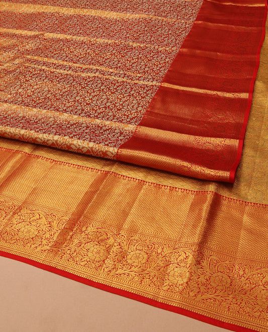 Red Kanchipuram Tissue Silk Saree, Richly Detailed with Floral Jaal Jacquard Design On Its Body, Highlighted by Zari Border of Thilakam Mokku, Muthu, Mayil Kann, and Kodi Visiry Designs, Grand Jaal Pallu, and Paired with a Matching Blouse