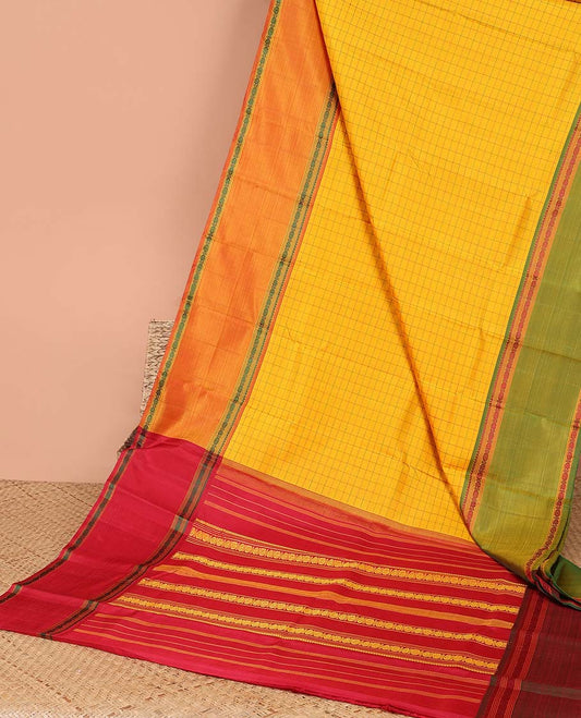 Yellow checked kancheepuram silk saree with contrast rettai pettu border & striped design pallu