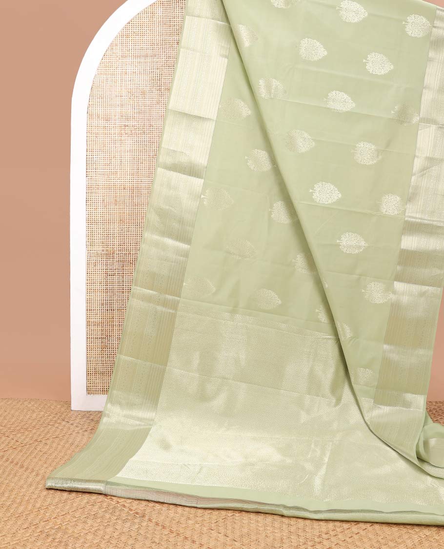 Mint green tree motifs vasundhara elite silk saree with self intricate zari design border & vanki design pallu