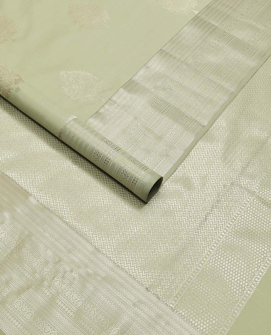 Mint green tree motifs vasundhara elite silk saree with self intricate zari design border & vanki design pallu