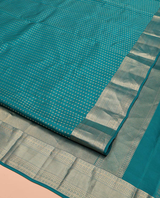 Blue Vasundhara Lite Silk Mix Saree, Embellished with Zari Buttas All Over Its Body, Highlighted by a Zari Border of Rettai Neli, Poun, Banaras, Manga, and Mayil Kann Designs, Grand Pallu, and Paired with a Matching Blouse