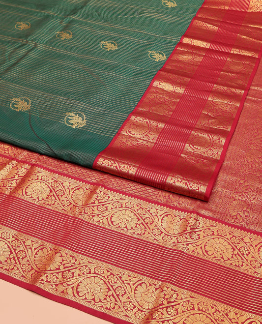 Green Vasundhara Silk Saree, Beautifully Bedecked with Zari Buttas and Checks All Over Its Body, Complemented by Contrast Border of Rekku, Muthu, and Kodi Visiry Designs, Intricately Designed Pallu, and Paired with a Contrast Blouse