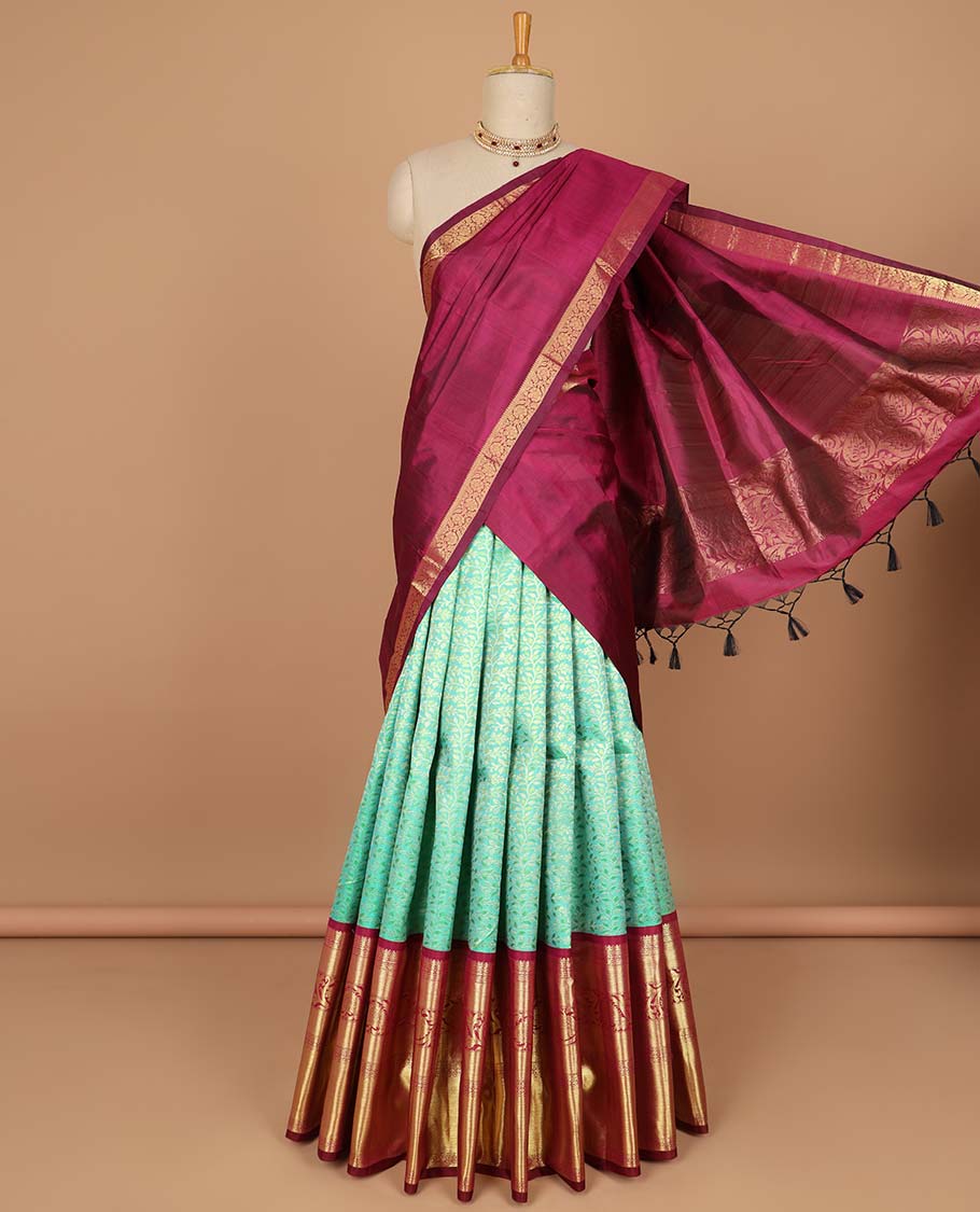 Green floral jacquard pure half silk saree with contrast zari border,  contrast zari design blouse & plain with zari border dhavani