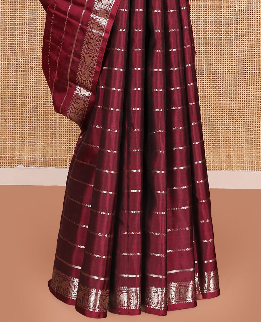 Maroon zari design Kanchipuram silk saree, zari border of reeku, kathir, muthu, yaanai, and mayil designs, and vanki design pallu