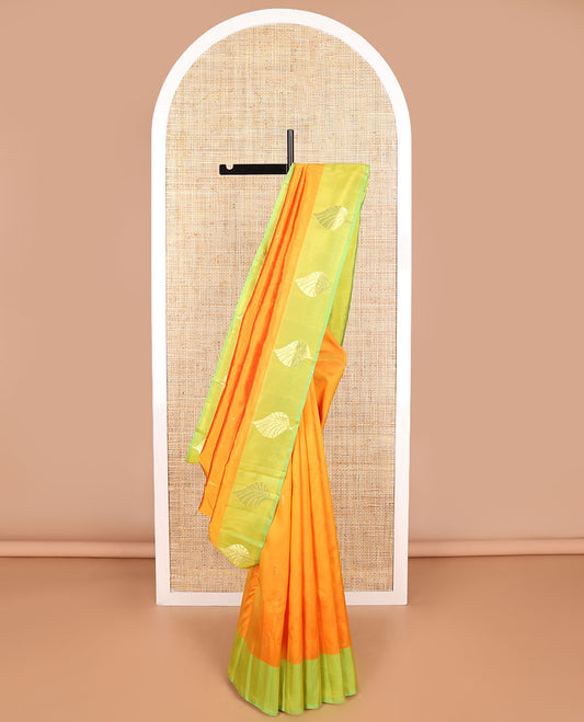 Orange butta kancheepuram silk saree with contrast leaf design border & floral design pallu
