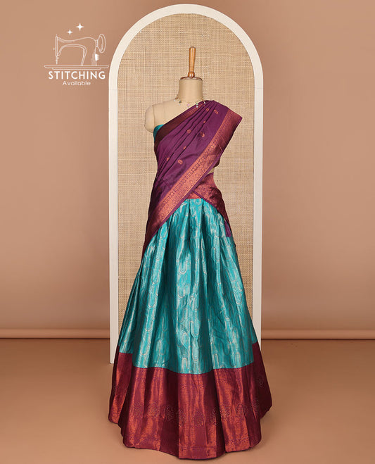 Light blue floral buttas half saree with contrast intricate zari design border, zari design blouse & floral zari design dhavavni