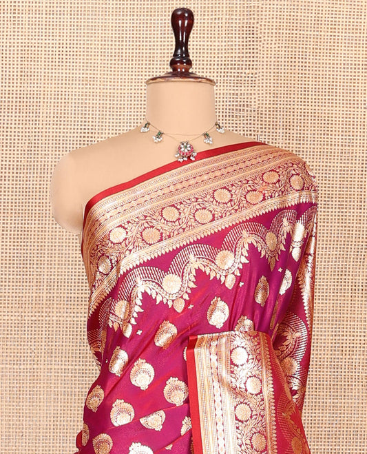 Magenta Banarasi Nylon Saree, Embellished with Zari Buttas, a Traditional Zari Border, Intricate Pallu, and a Matching Blouse