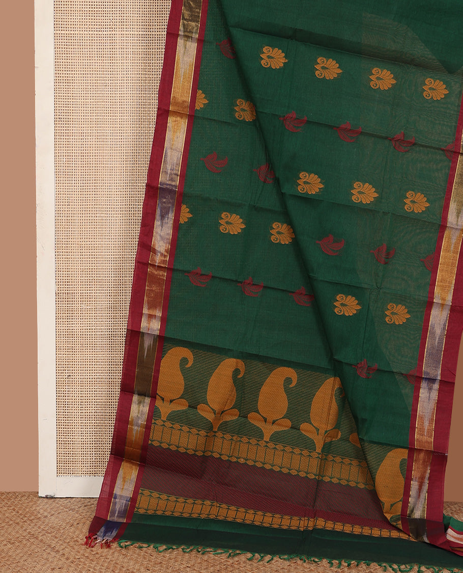 Green buttas kanchi cotton saree, contrast ikkat border, and paisley-geometric pallu