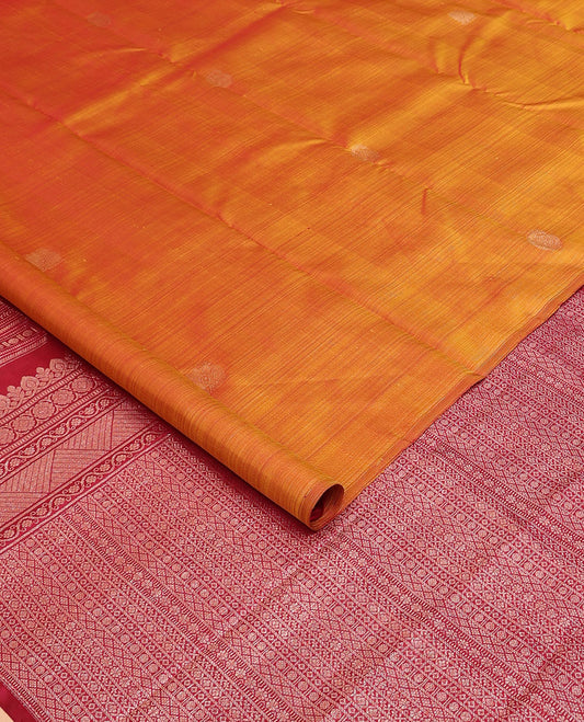 Borderless orange manga zari buttas Kanchipuram silk saree, contrast geometric patterned pallu