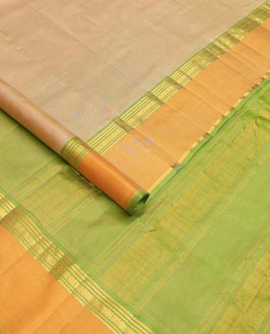 Sandal plain Kanchipuram silk saree, contrast rettai pettu border of rekku, banaras, cross kamalam, and poun designs, and zari design pallu