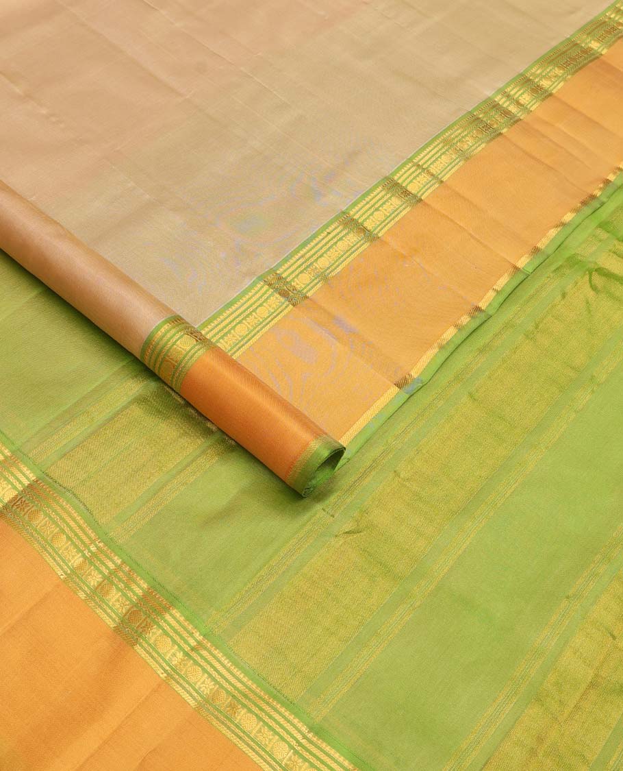 Sandal plain Kanchipuram silk saree, contrast rettai pettu border of rekku, banaras, cross kamalam, and poun designs, and zari design pallu