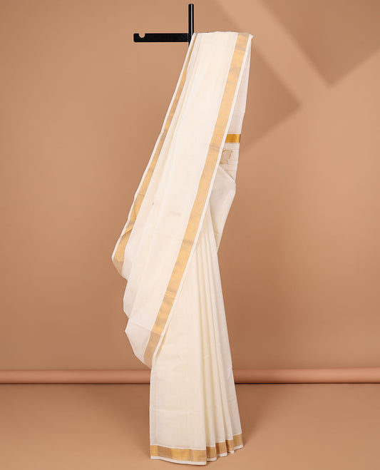 Cream kerala saree, zari border & pallu of butterflies in zari