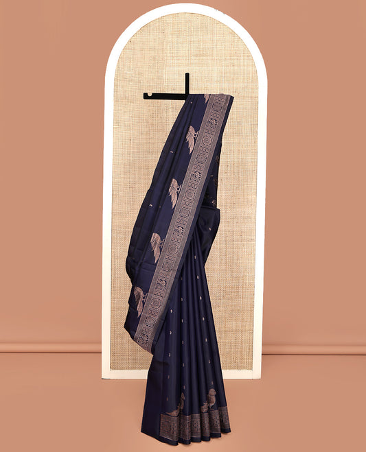 Blue Mayuri Soft Silk Saree, Finely Crafted with Buttas All Over Its Body, Highlighted by Self-Border of Parrot, Chakram, and Mayil Designs, Pallu Steeped with Parrot Designs, and Paired with a Matching Blouse