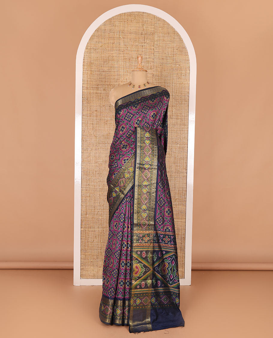 Navy blue intricate design patola saree, contrast traditional zari and double-ikkat style border, printed pallu, and blouse of print, and zari work
