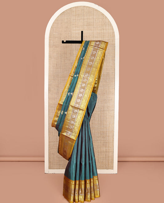 Green Venkatagiri Silk Saree,  Detailed with Zari Buttas All Over Its Body, Complemented by a Contrast Traditional Zari Design Border, Grand Jaal Pallu, and Paired with a Contrast Blouse