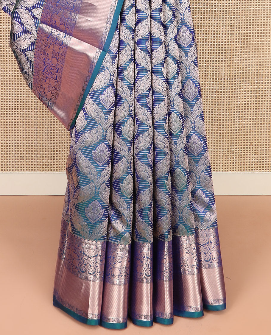 Blue Kanchipuram Wedding Silk Saree Graced with Ogee Jacquard Design, Complemented by Zari Border Featuring Thilakam Mokku, Kamalam, Manga, and Mayil Designs, Opulently Detailed Pallu of Annam Charkam Enclosed Checks, and Paired with a Matching Blouse