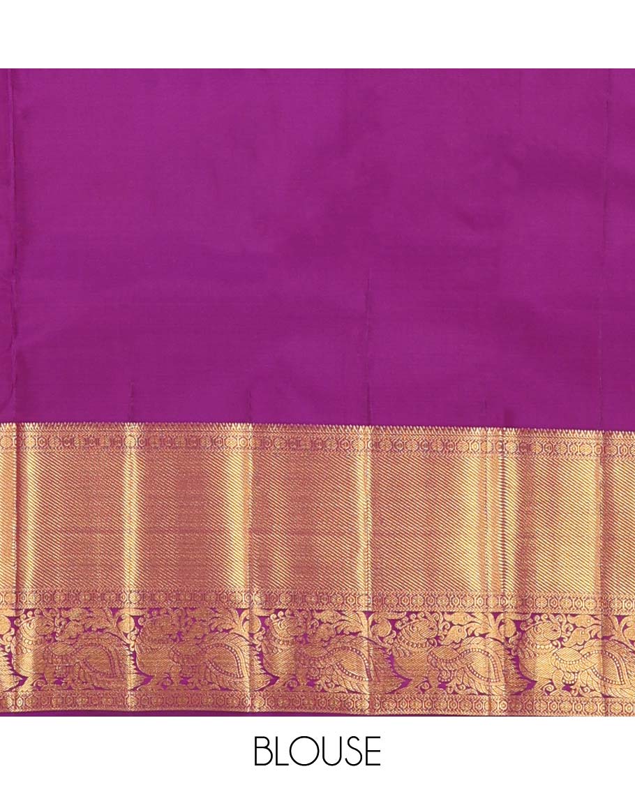 Yellow jacquard wedding silk saree, contrast border of thilakam, rudraksham, and mayil designs, and ogee design pallu