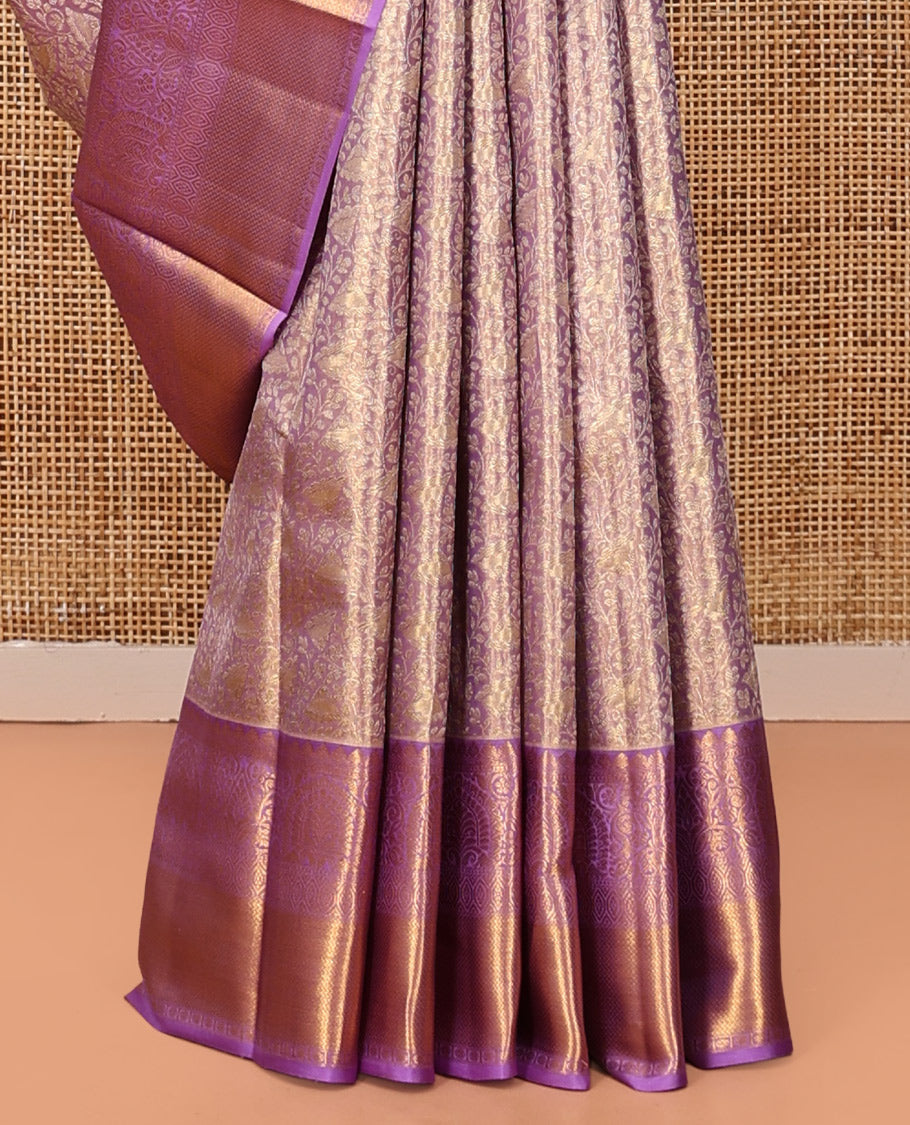 Lavender Kanchipuram Tissue Silk Saree, Elegantly Highlighted with Jacquard Design, Complemented by Contrast Border of Thilakam Mokku, and Vanki Designs, Grand Pallu, and Matching Blouse