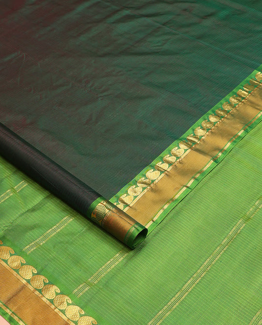 Green striped nine-yard silk saree, contrast rettai pettu border of mayil manga, and kathir designs, and zari striped pallu