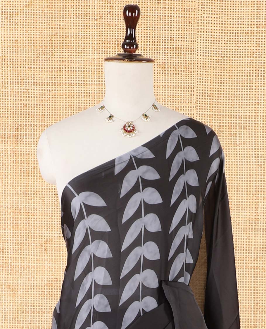 Borderless black half-half style crepe silk saree printed with grey color leaf vine design, leaf motifs printed blouse