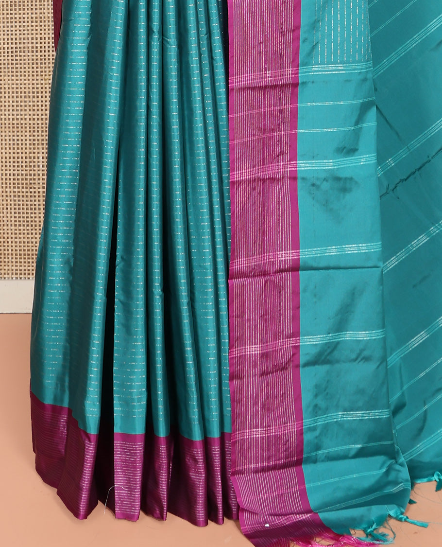 Blue Aarani Silk Saree, Enriched with Zari Stripes All Over Its Body, Complemented by a Contrast Zari Striped Border, Pallu of Stripes, and Paired with a Matching Blouse