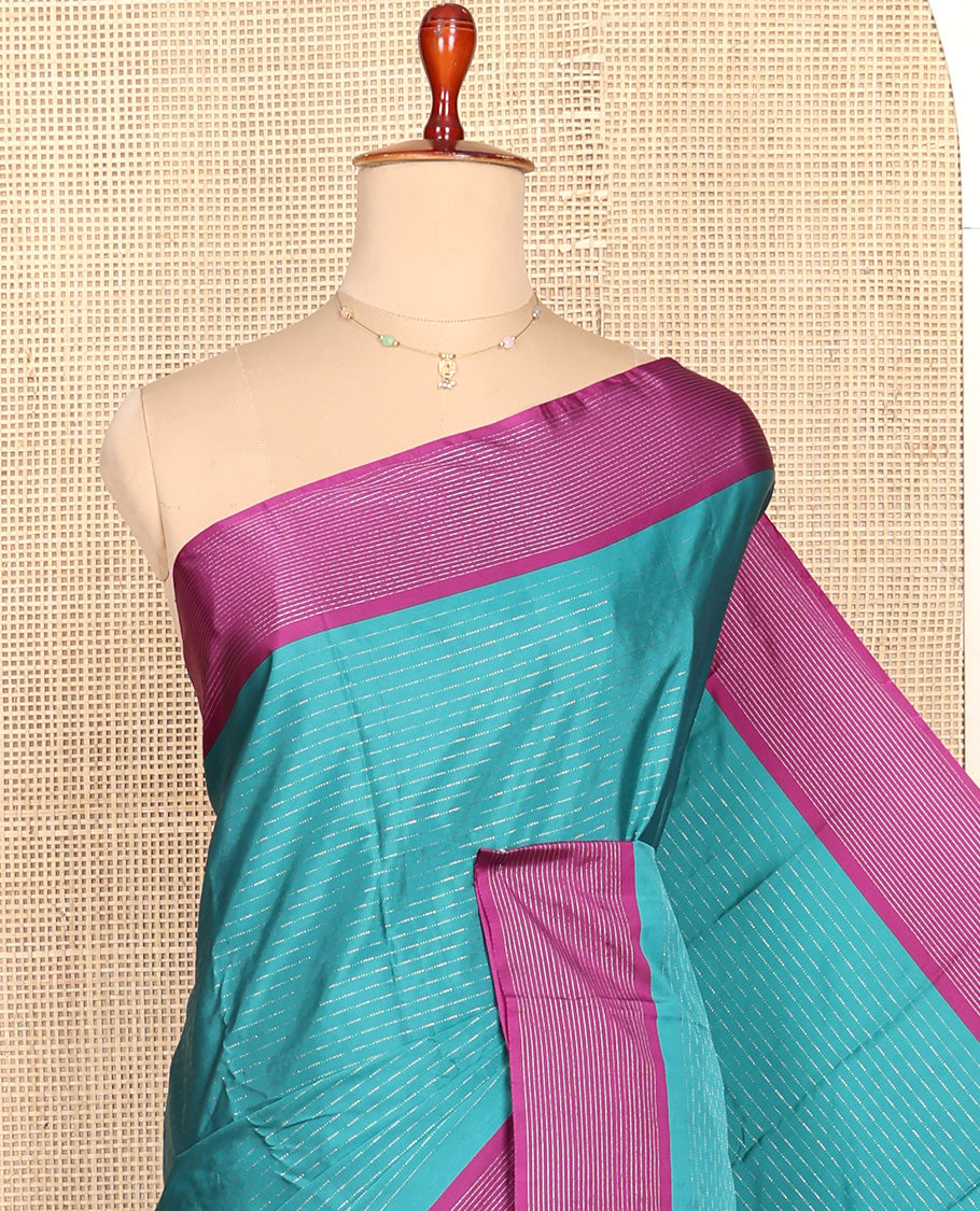 Blue Aarani Silk Saree, Enriched with Zari Stripes All Over Its Body, Complemented by a Contrast Zari Striped Border, Pallu of Stripes, and Paired with a Matching Blouse