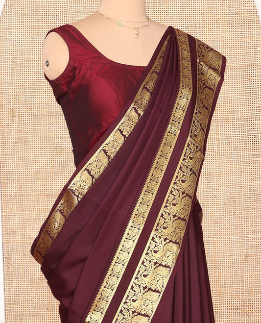Maroon Plain Mysore Silk Saree, Richly Detailed with Zari Border of Peacock Designs, Sparsely Woven Pallu of Stripes, and Paired with a Matching Blouse