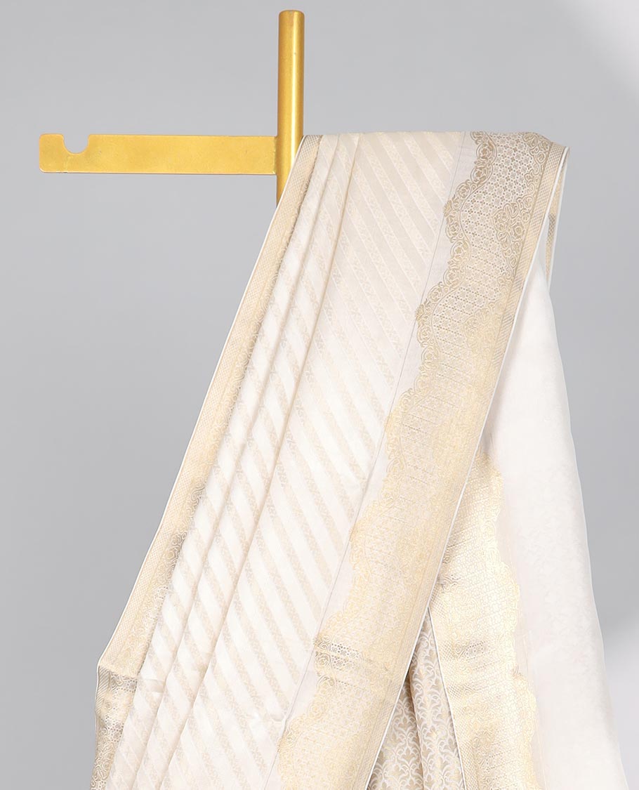 Cream striped mysore silk saree with self zari checked border & intricate zari design pallu