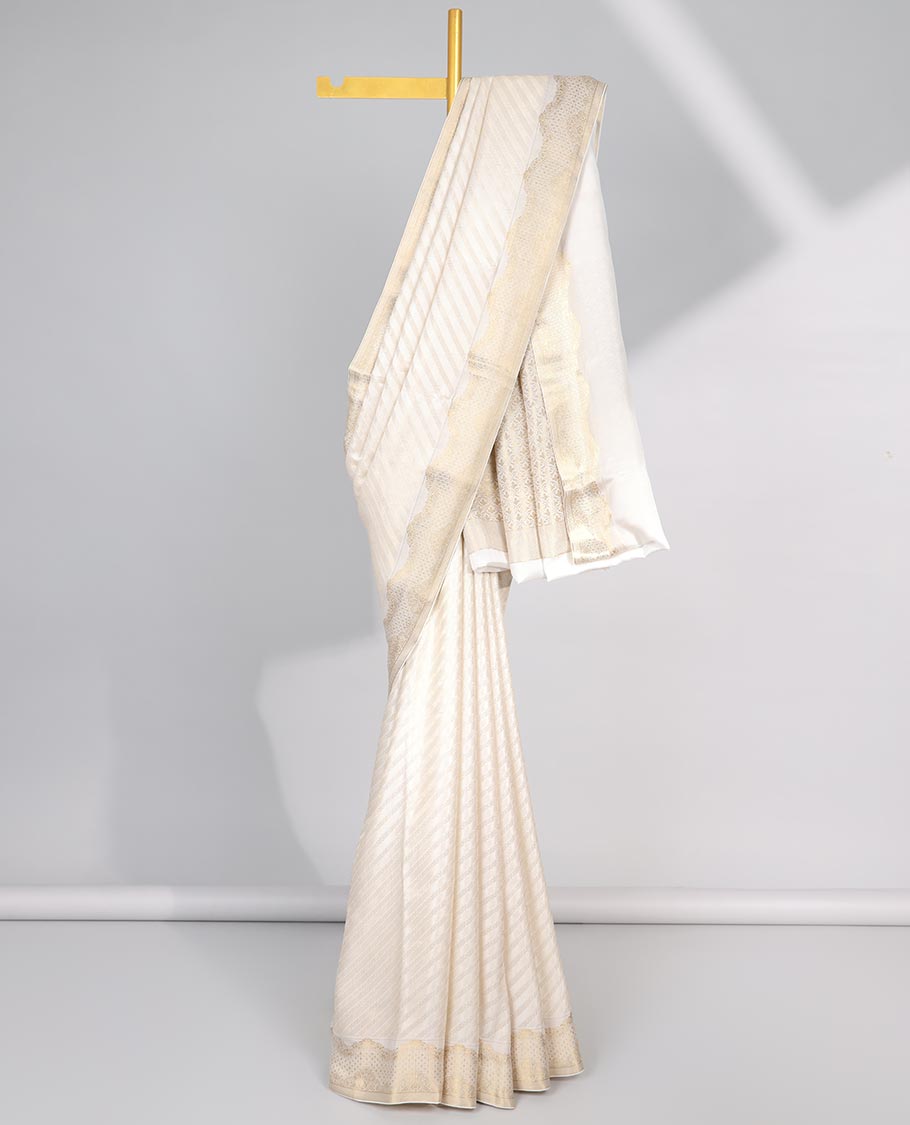 Cream striped mysore silk saree with self zari checked border & intricate zari design pallu