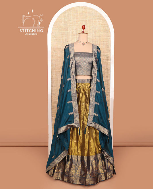 Gold-blue zari buttas half-saree with contrast intricate motifs woven bordered skirt, brocade blouse, and a zari design dhavani
