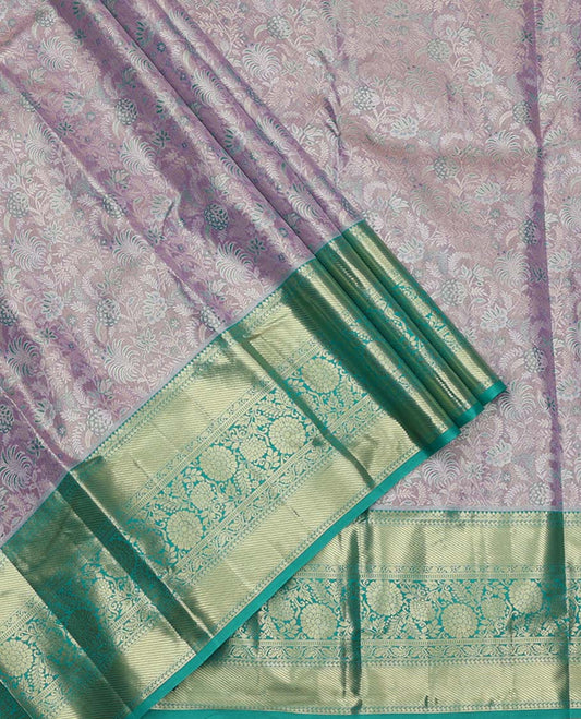 Grey Art Silk Material Half Saree Set, Adorned with Jacquard Design Skirt, a Contrast Traditional Zari Design Border, Contrast Zari-Jacquard Blouse, and a Dhavani of Paisley Designs