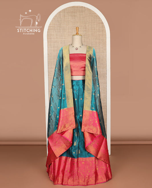 Blue buttas tissue half saree with contrast zari design border, zari design blouse & floral design dhavani