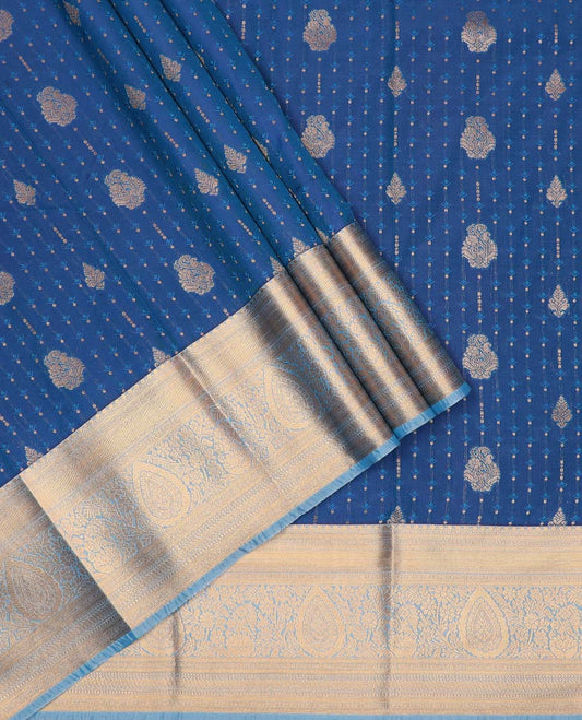 Blue art silk pavadai material, zari buttas with embossed contrast traditional zari border skirt, and contrast blouse