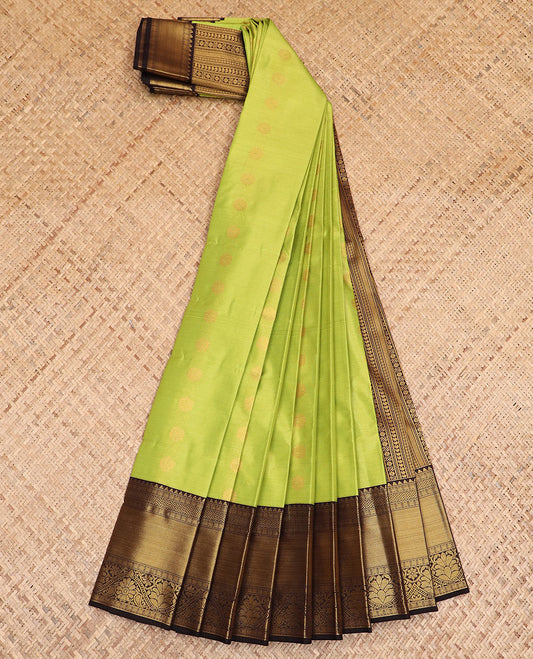 Green zari stripes and buttas budget silk saree, contrast traditional zari border, and geometric patterned pallu