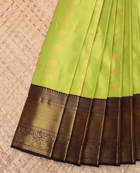 Green zari stripes and buttas budget silk saree, contrast traditional zari border, and geometric patterned pallu