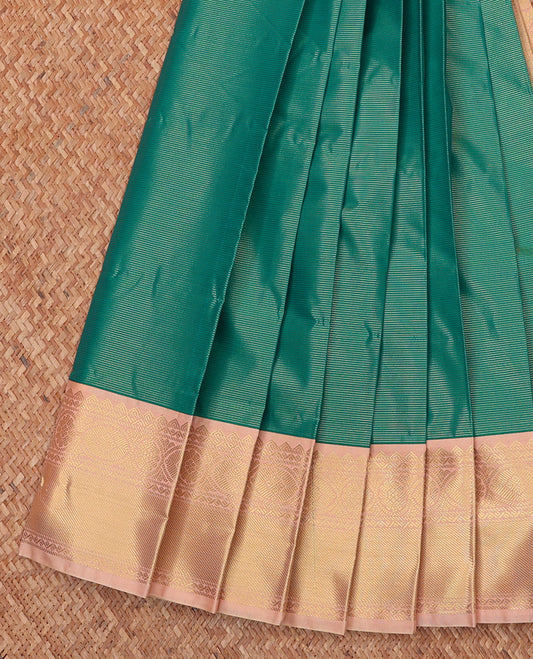 Green Budget Silk Saree, Subtly Sparkled With Zari Weave On Its Body, Complemented by Contrast Traditional Zari Designs Woven Border, Grand Pallu and Paired with a Contrast Blouse