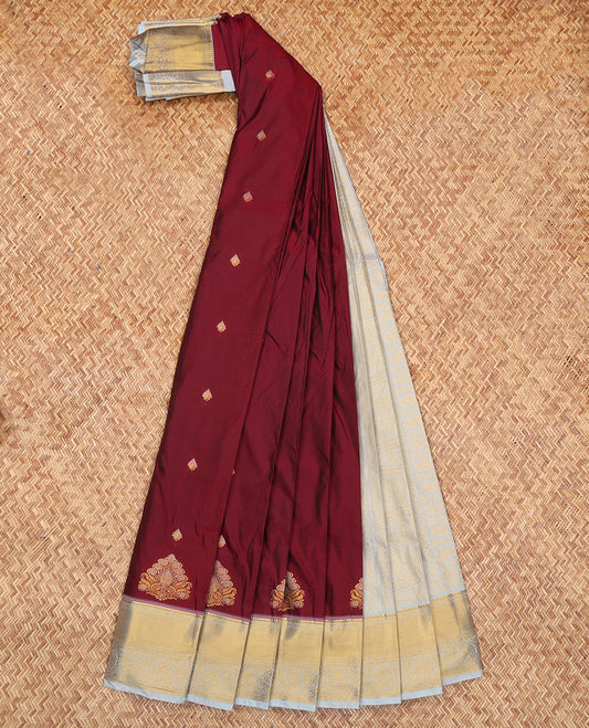 Maroon Budget Silk Saree, Adorned with Zari Buttas, Complemented by a Contrast Traditional Zari Border, Grand Pallu, and Contrast Blouse