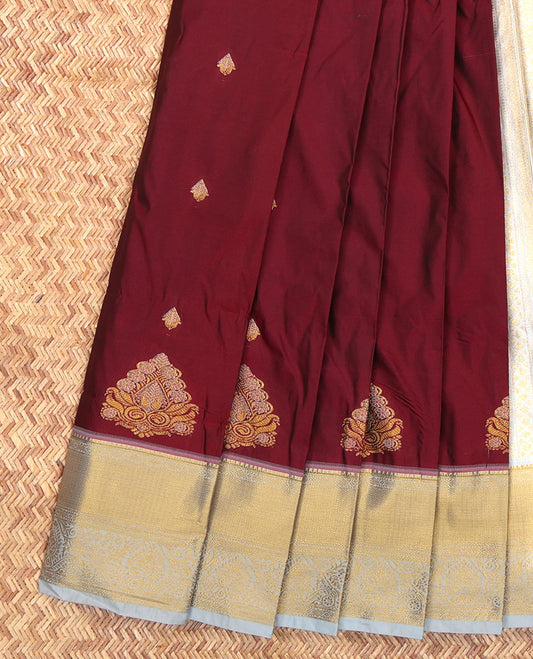 Maroon Budget Silk Saree, Adorned with Zari Buttas, Complemented by a Contrast Traditional Zari Border, Grand Pallu, and Contrast Blouse